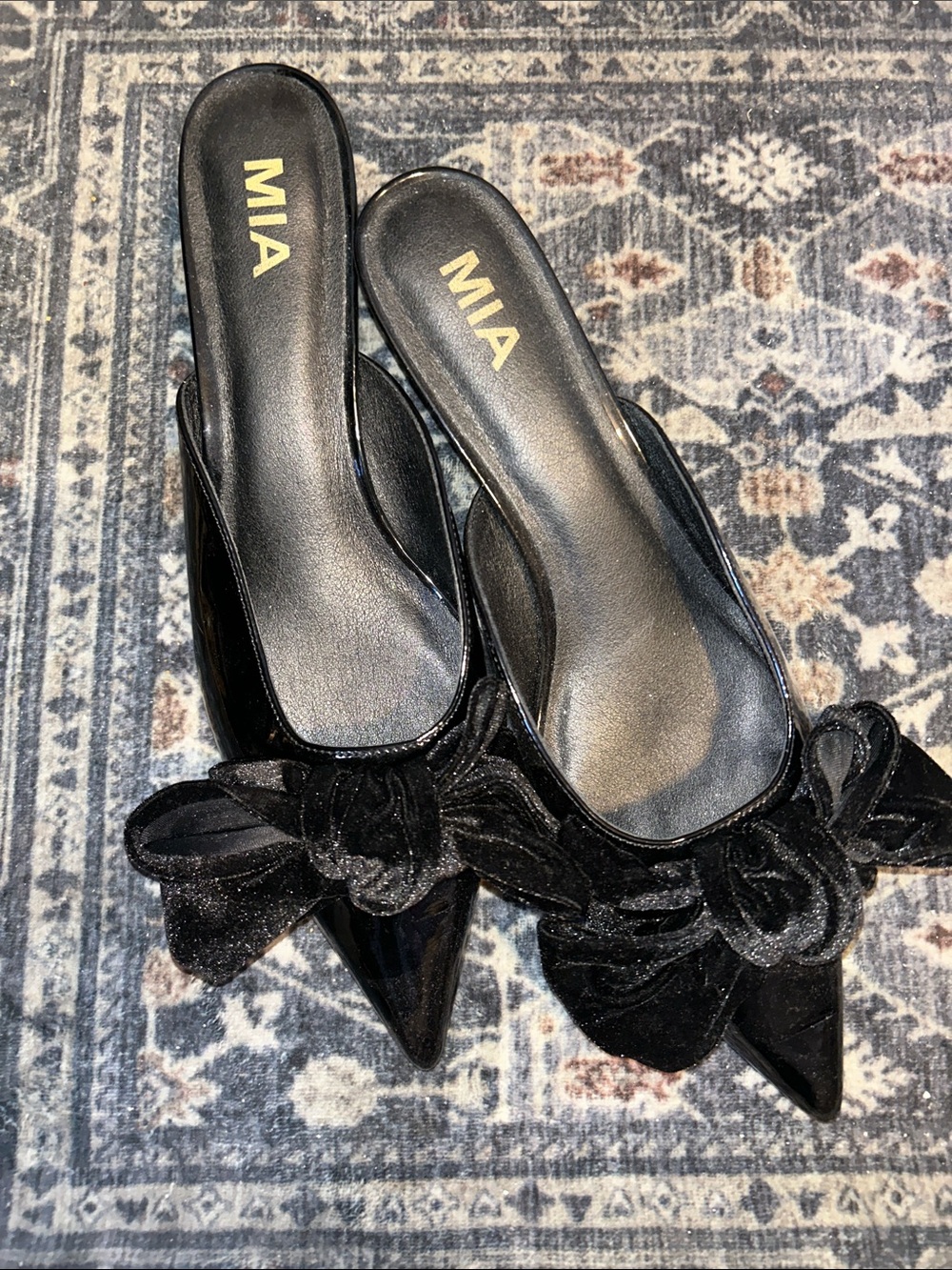 MIA Black Pointed-Toe Slide Mules with Velvet Bow
